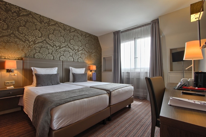 Imagen de la habitación del Hotel Timhotel Opera Blanche Fontaine. Foto 3