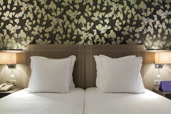 Imagen de la habitación del Hotel Timhotel Opera Blanche Fontaine. Foto 10