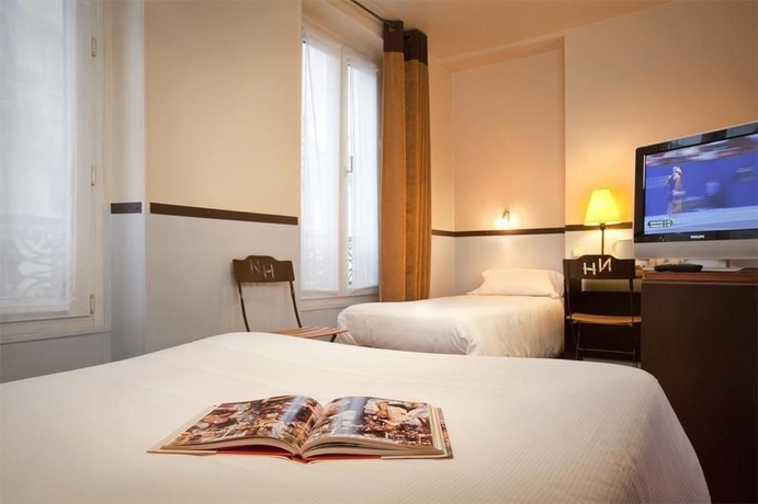 Imagen de la habitación del Hotel Timhotel Paris Gare Du Nord. Foto 9