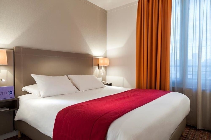 Imagen de la habitación del Hotel Timhotel Tour Eiffel. Foto 7