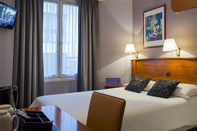 Imagen de la habitación del Hotel Timhotel Tour Eiffel. Foto 9