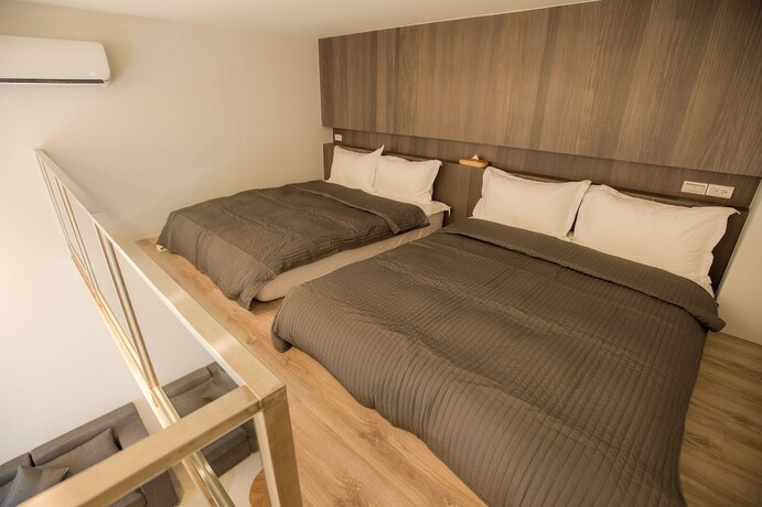 Imagen de la habitación del Hotel Timia. Foto 19