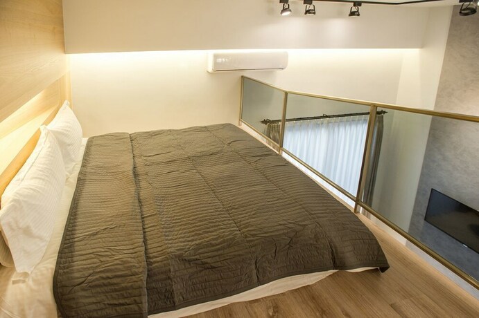 Imagen de la habitación del Hotel Timia. Foto 26