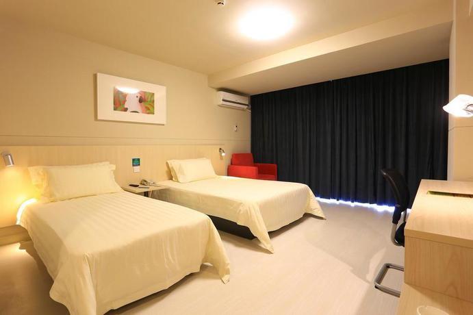 Imagen de la habitación del Hotel Timton International. Foto 12