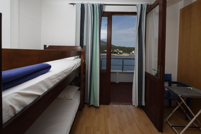 Imagen de la habitación del Hotel Timun. Foto 2