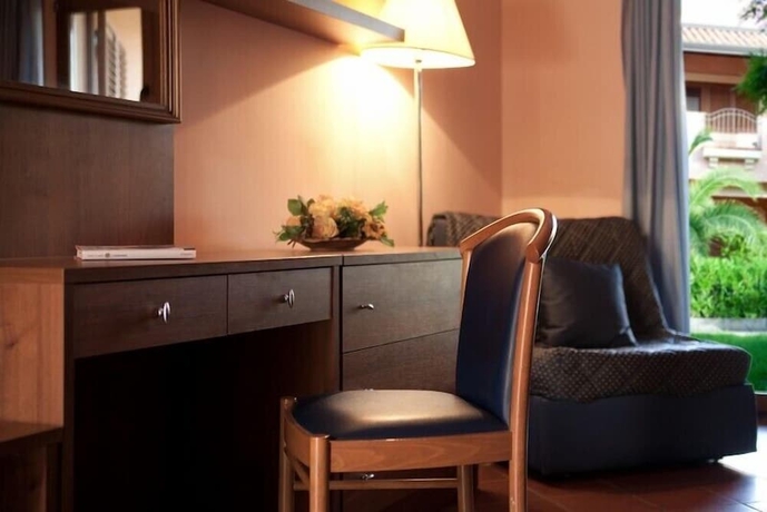 Imagen de la habitación del Hotel Tindari Resort Y Marina Beach. Foto 4