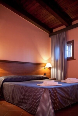 Imagen de la habitación del Hotel Tindari Resort Y Marina Beach. Foto 8