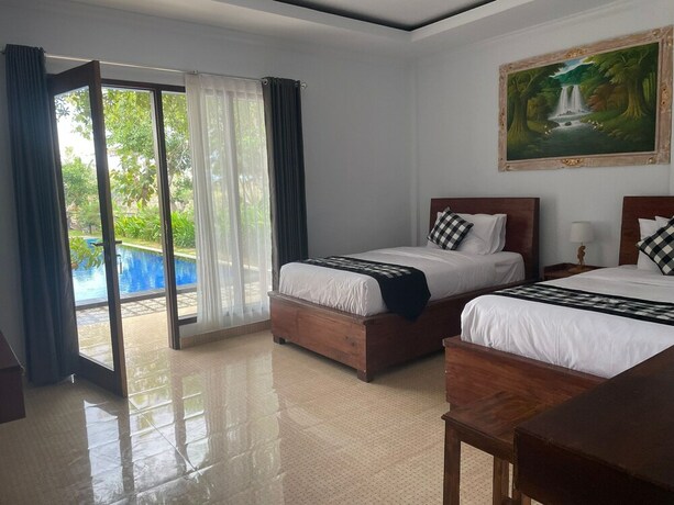 Imagen de la habitación del Hotel Tinggian Hill Retreat. Foto 18