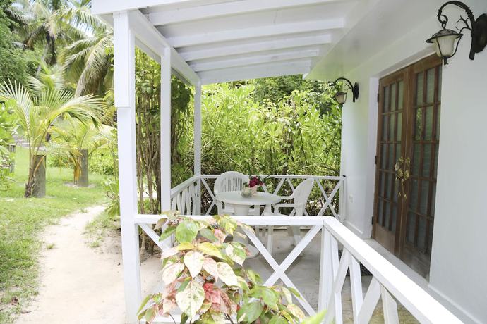 Imagen de la habitación del Hotel Tingum Village. Foto 3