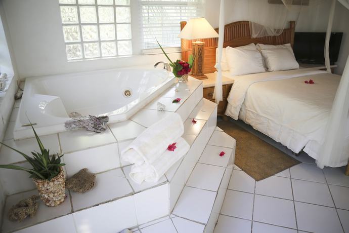 Imagen de la habitación del Hotel Tingum Village. Foto 4