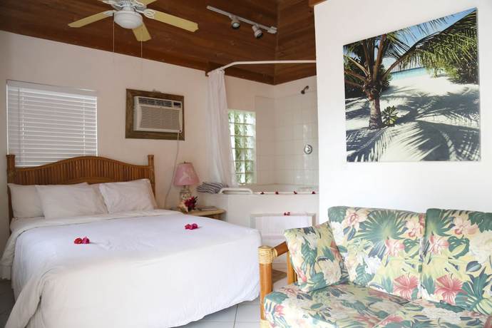 Imagen de la habitación del Hotel Tingum Village. Foto 5