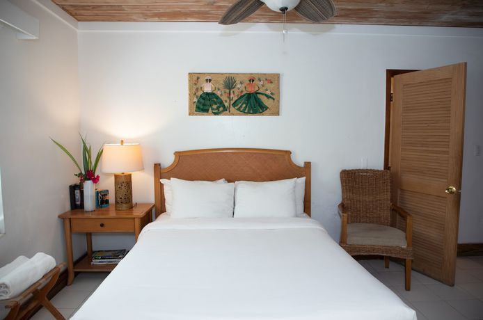 Imagen de la habitación del Hotel Tingum Village. Foto 9