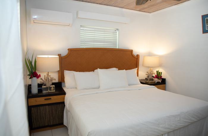 Imagen de la habitación del Hotel Tingum Village. Foto 13