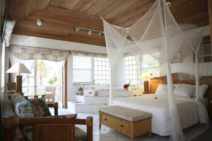 Imagen de la habitación del Hotel Tingum Village. Foto 14