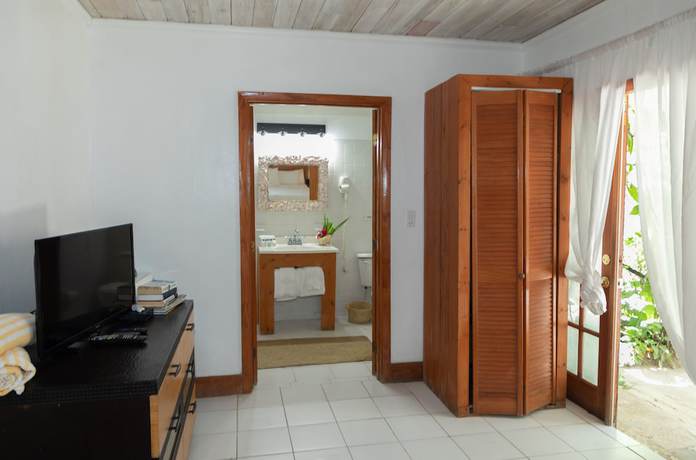 Imagen de la habitación del Hotel Tingum Village. Foto 19