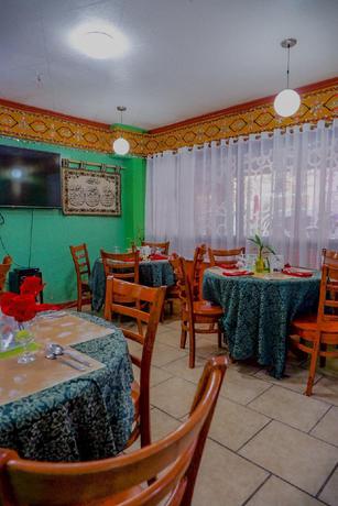 Imagen del bar/restaurante del Hotel Tinhat Boutique and Restaurant. Foto 17