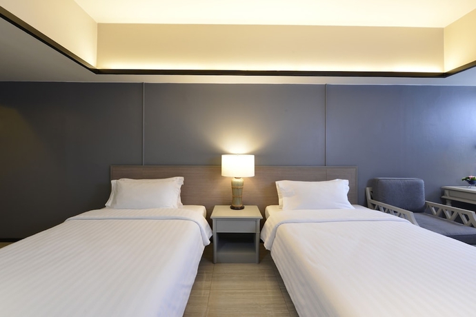 Imagen de la habitación del Hotel Tinidee Bangkok Golf Club. Foto 3