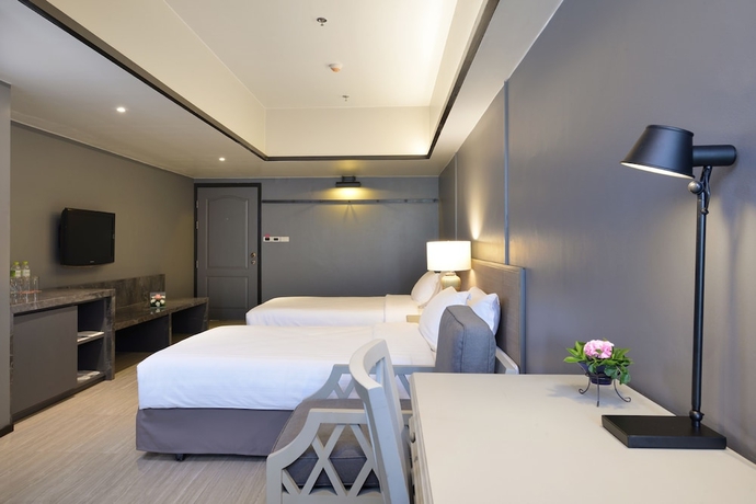 Imagen de la habitación del Hotel Tinidee Bangkok Golf Club. Foto 4