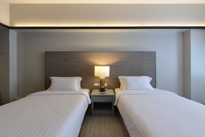 Imagen de la habitación del Hotel Tinidee Bangkok Golf Club. Foto 10