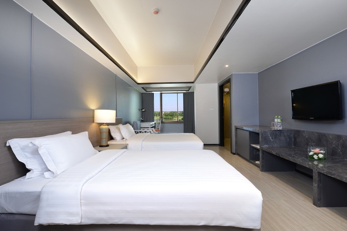 Imagen de la habitación del Hotel Tinidee Bangkok Golf Club. Foto 11
