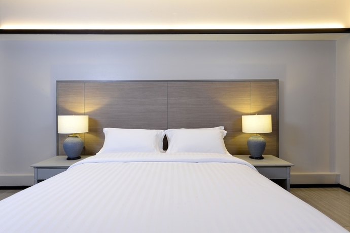 Imagen de la habitación del Hotel Tinidee Bangkok Golf Club. Foto 12