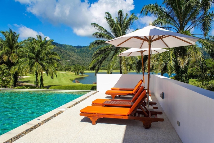 Imagen de la piscina del Hotel Tinidee Golf Resort Phuket. Foto 15