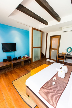 Imagen de la habitación del Hotel Tinkerbell Resort. Foto 2