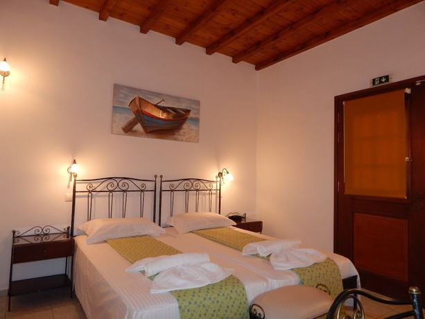 Imagen de la habitación del Hotel Tinos Suites and Apartments. Foto 10