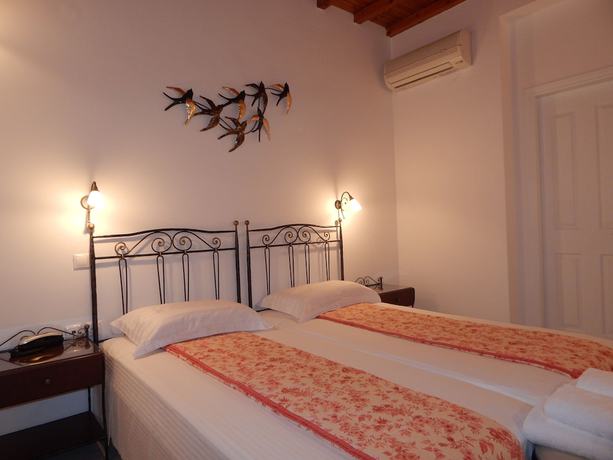 Imagen de la habitación del Hotel Tinos Suites and Apartments. Foto 12