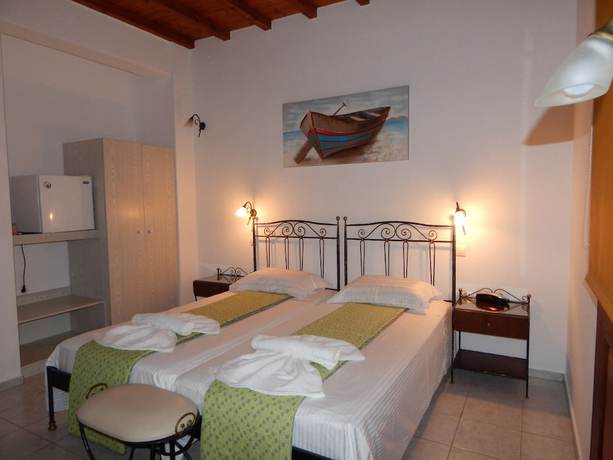 Imagen de la habitación del Hotel Tinos Suites and Apartments. Foto 16