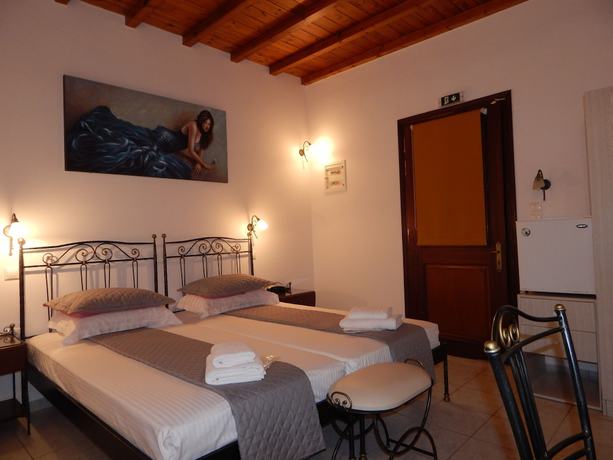 Imagen de la habitación del Hotel Tinos Suites and Apartments. Foto 17