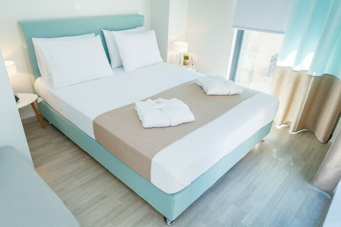 Imagen de la habitación del Hotel Tins City. Foto 12