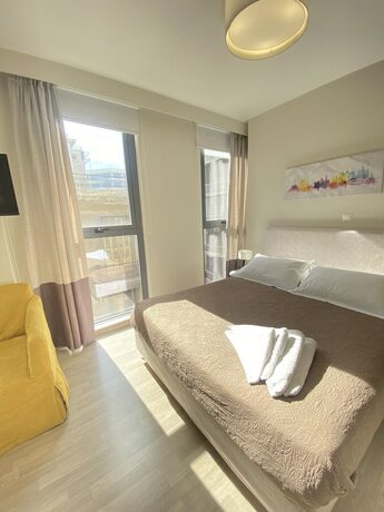 Imagen de la habitación del Hotel Tins City. Foto 14