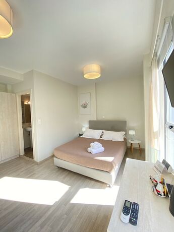 Imagen de la habitación del Hotel Tins City. Foto 15