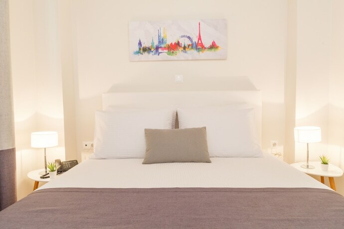 Imagen de la habitación del Hotel Tins City. Foto 16