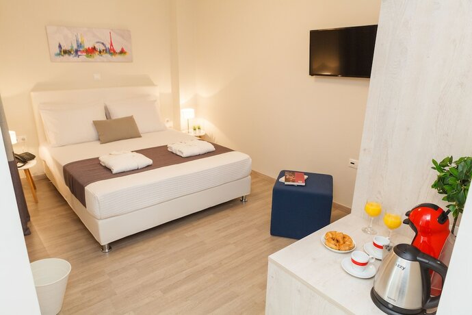 Imagen de la habitación del Hotel Tins City. Foto 17