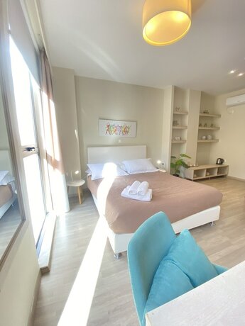 Imagen de la habitación del Hotel Tins City. Foto 20