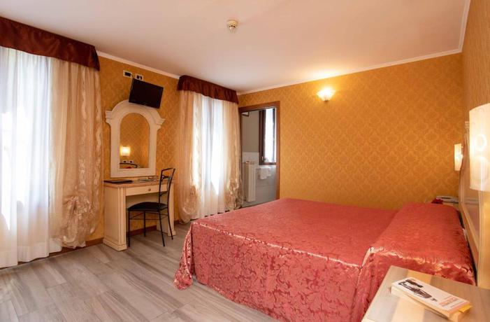 Imagen de la habitación del Hotel Tintoretto. Foto 14