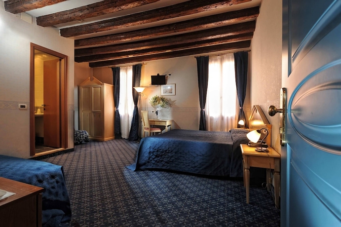 Imagen de la habitación del Hotel Tintoretto. Foto 10