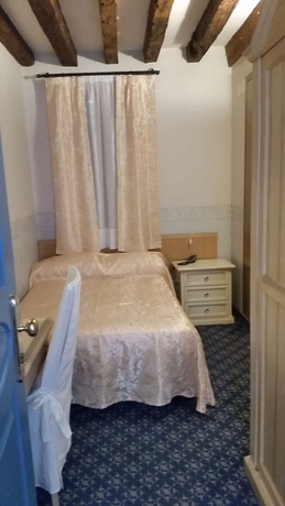 Imagen de la habitación del Hotel Tintoretto. Foto 13