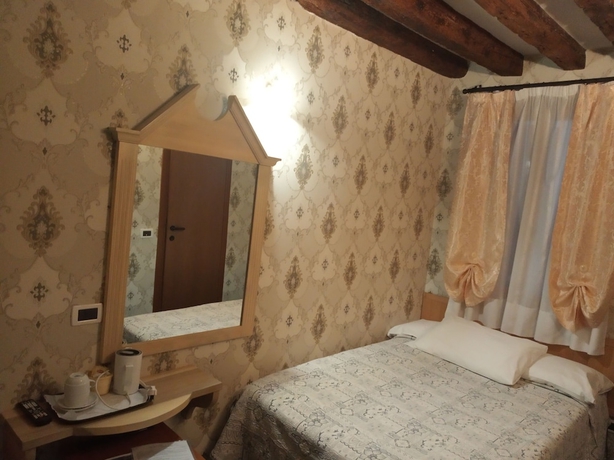 Imagen de la habitación del Hotel Tintoretto. Foto 18