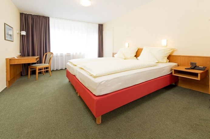 Imagen de la habitación del Hotel Tinytwice Bonn. Foto 13