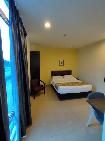 Imagen de la habitación del Hotel Tiong Hua. Foto 6
