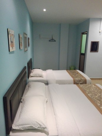 Imagen de la habitación del Hotel Tiong Hua. Foto 7