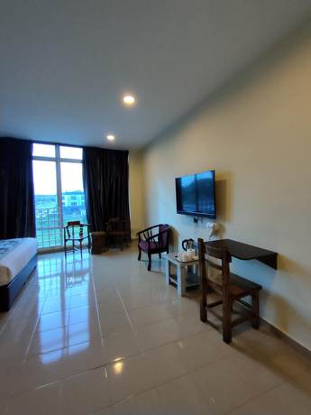 Imagen de la habitación del Hotel Tiong Hua. Foto 11