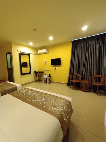 Imagen de la habitación del Hotel Tiong Hua. Foto 14
