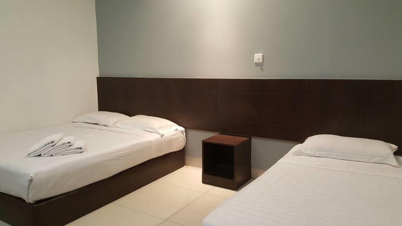 Imagen de la habitación del Hotel Tiong Nam. Foto 7