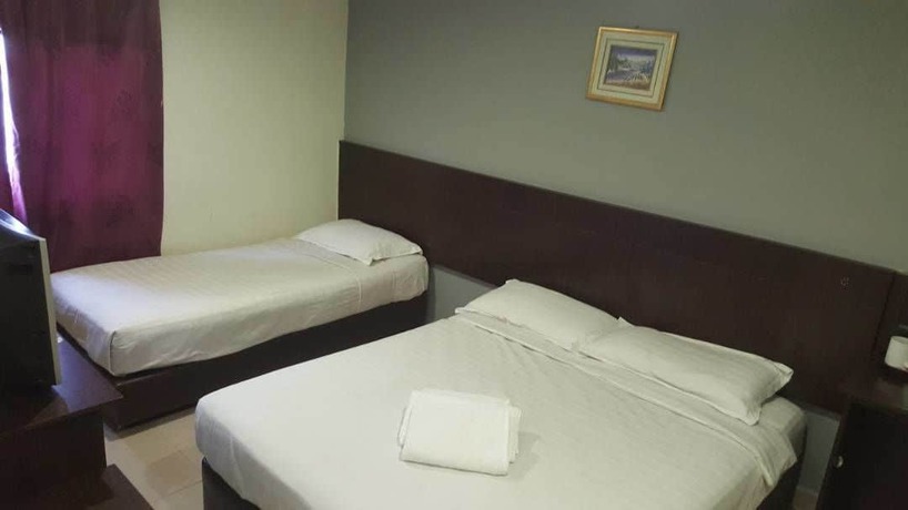 Imagen de la habitación del Hotel Tiong Nam. Foto 12