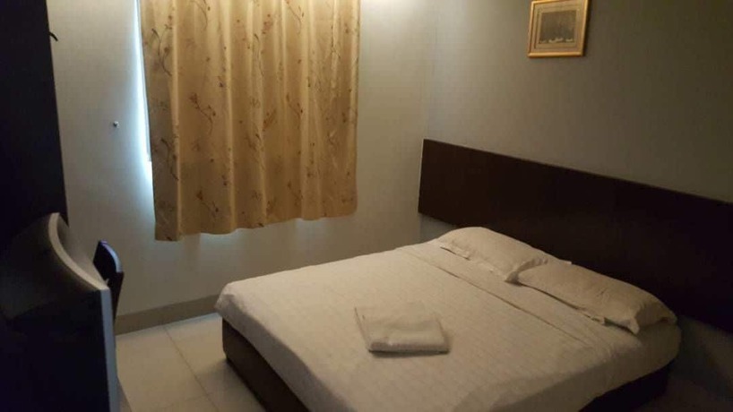 Imagen de la habitación del Hotel Tiong Nam. Foto 13