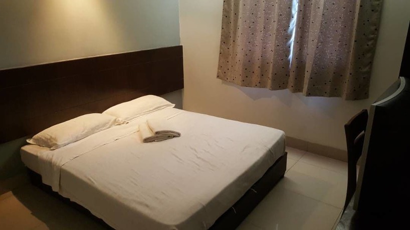 Imagen de la habitación del Hotel Tiong Nam. Foto 14